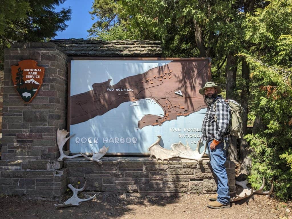 John at Isle Royal Entrance Sign